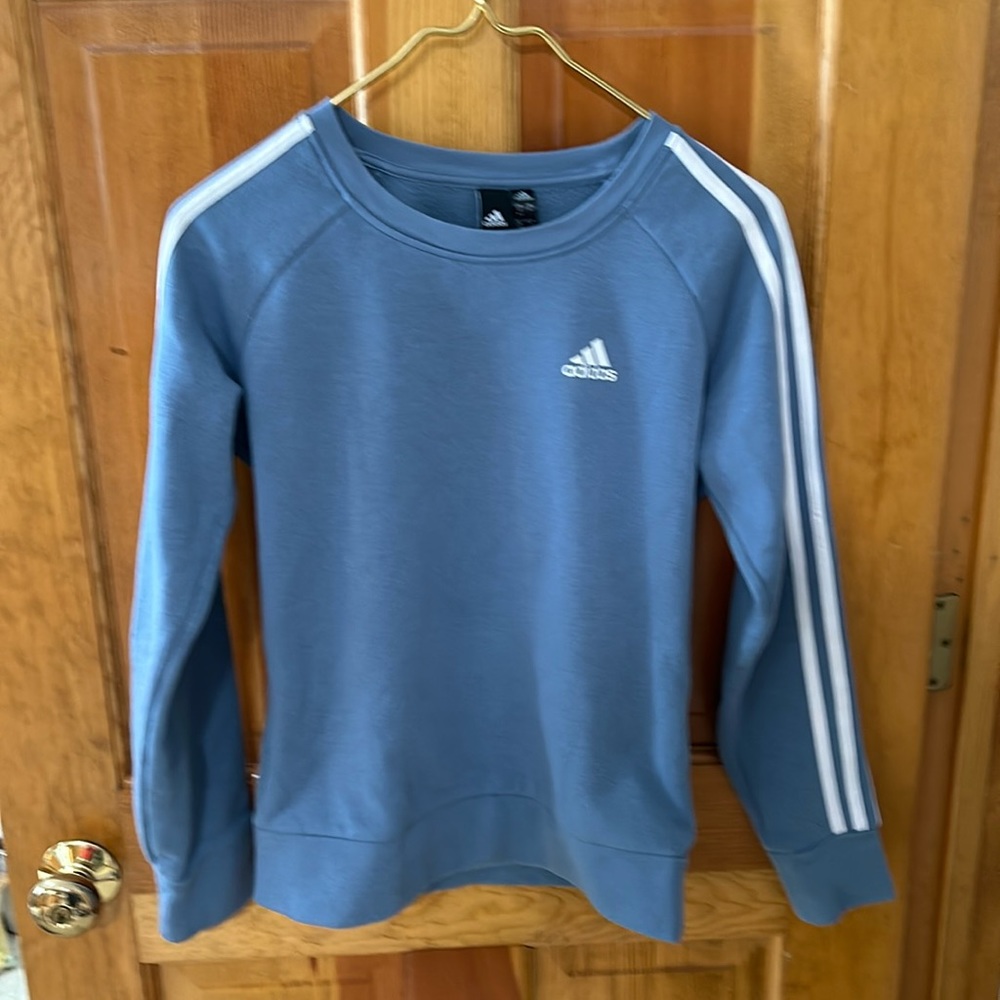 Adidas light blue women’s crew neck sweatshirt.  Size XS